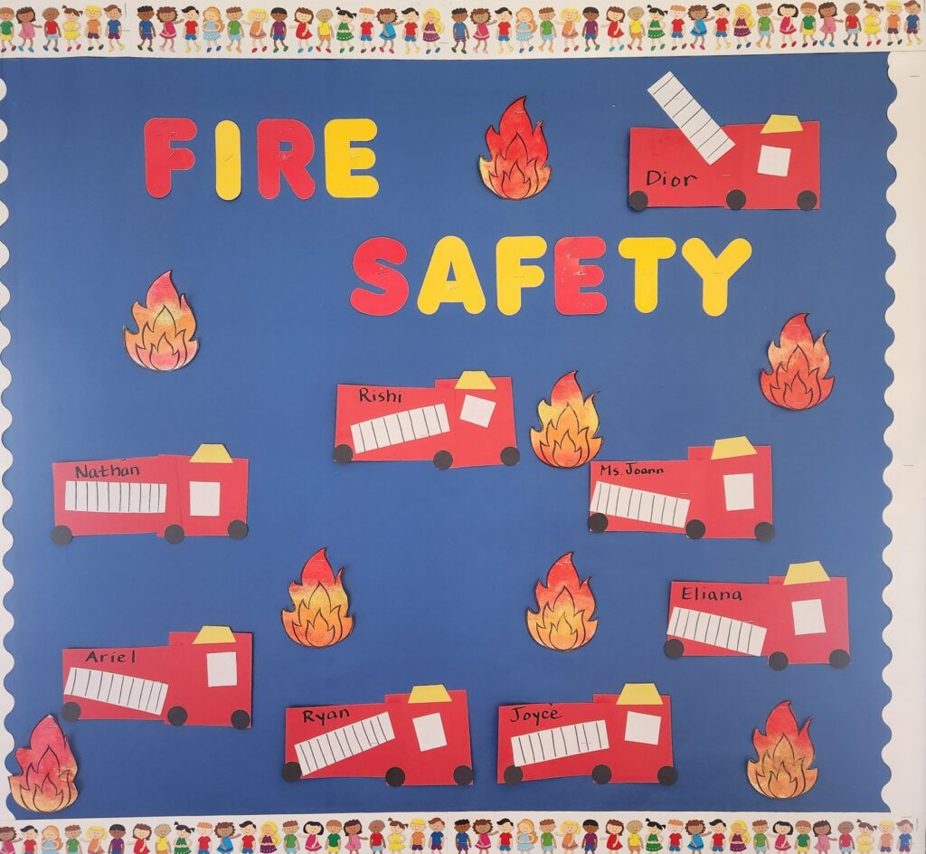 Fire Safety Week art display of paper firetrucks