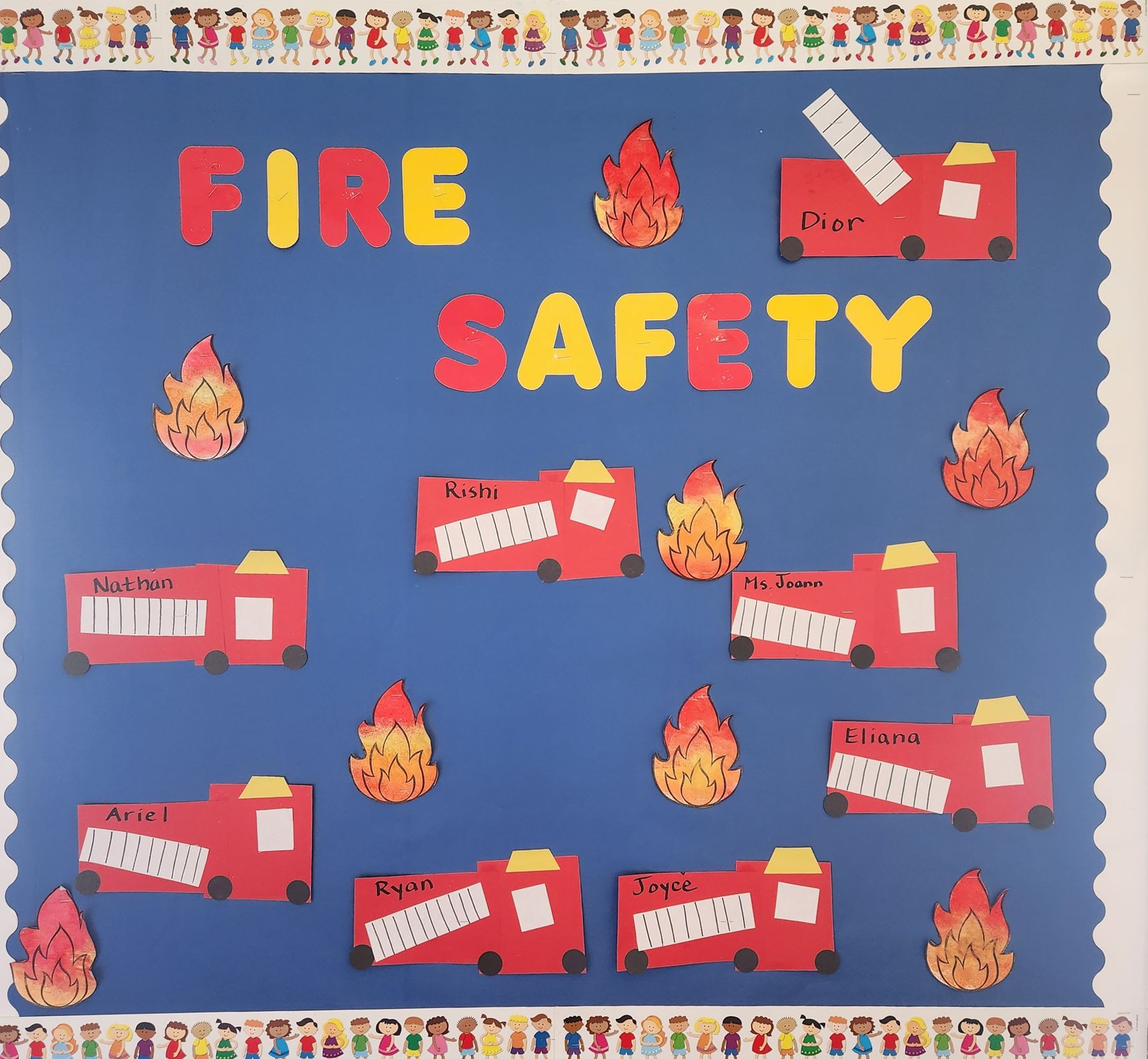 Fire Safety Week art display of paper firetrucks