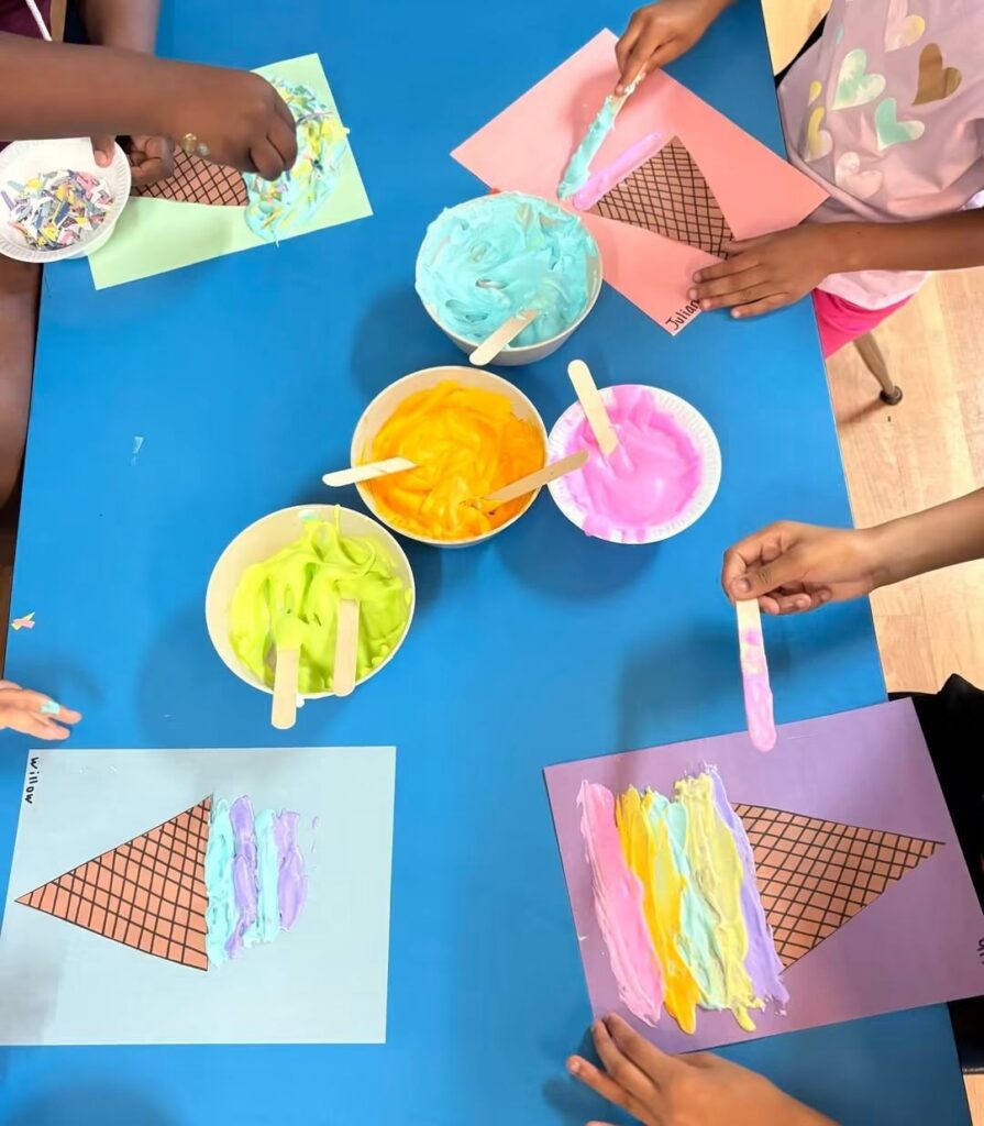 Summer campers painting ice cream cones